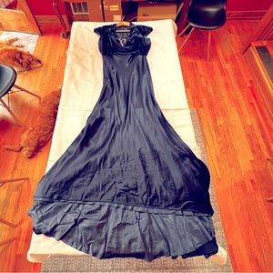 Navy blue, satin, ball gown. Long train. Runs large.